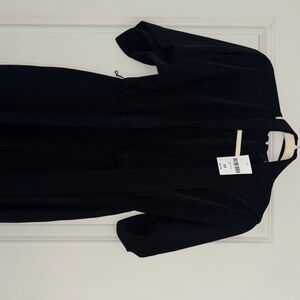 Black jumpsuit low neckline brand new